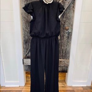 One piece black romper new with tags